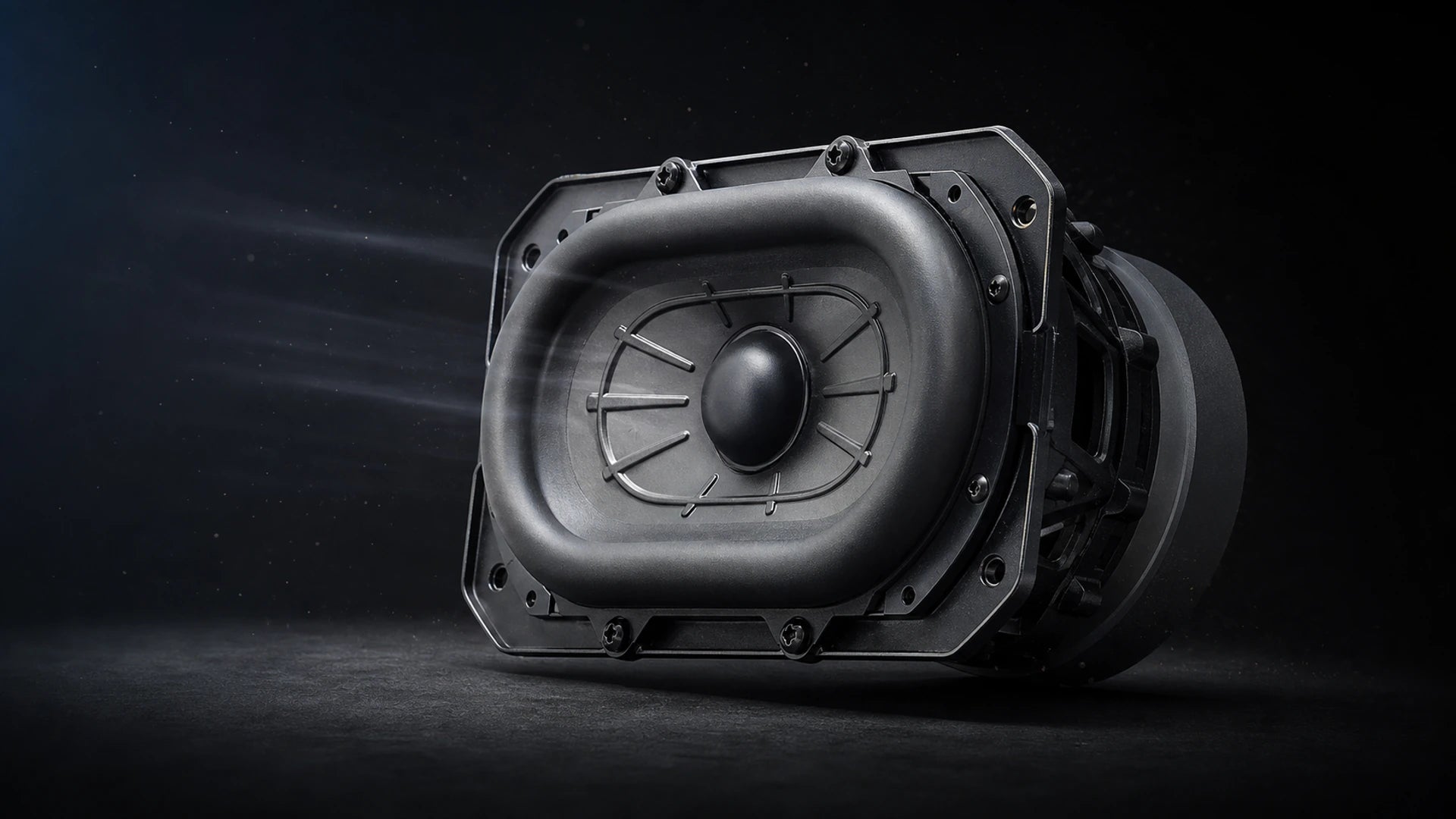 Macro view of the Sonic Boom Max racetrack woofer and passive radiator with restrained air-pressure detail