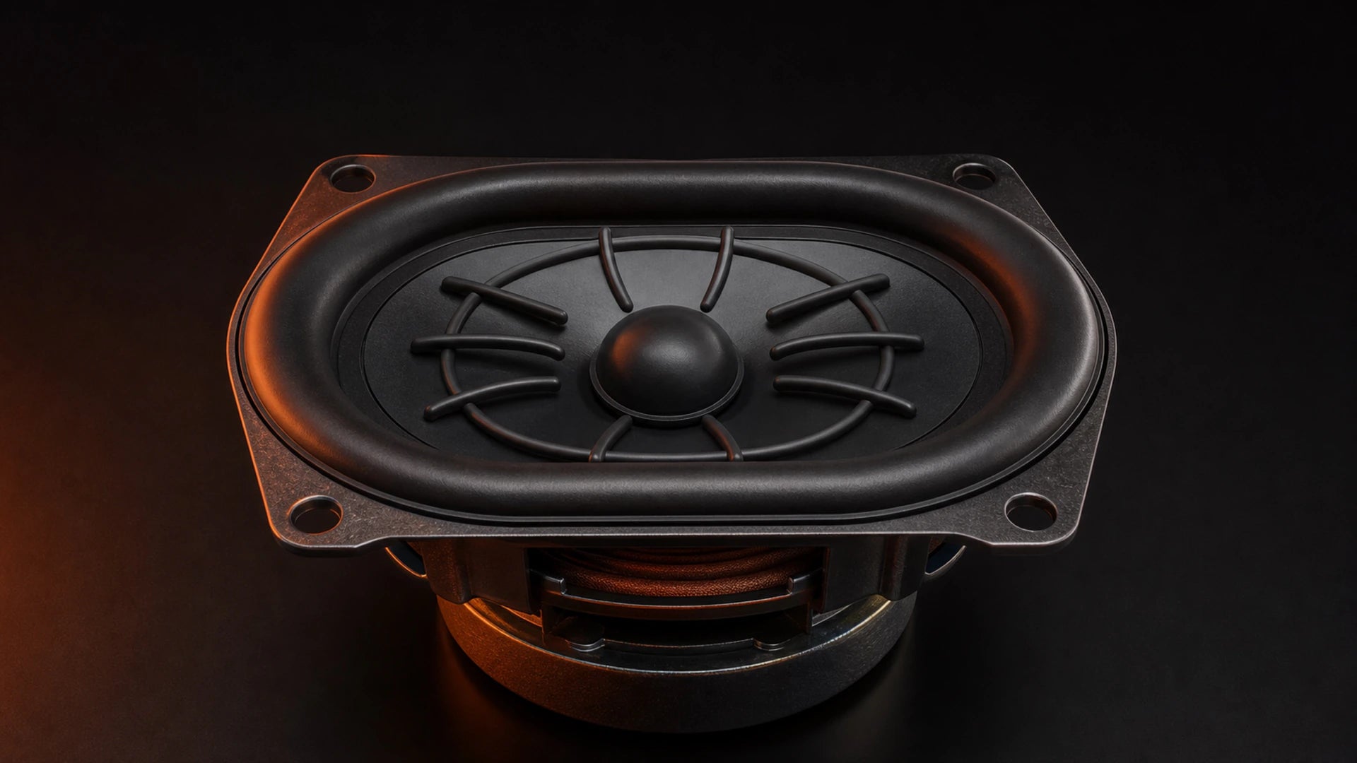 Racetrack mid-bass driver component on a dark soundstage